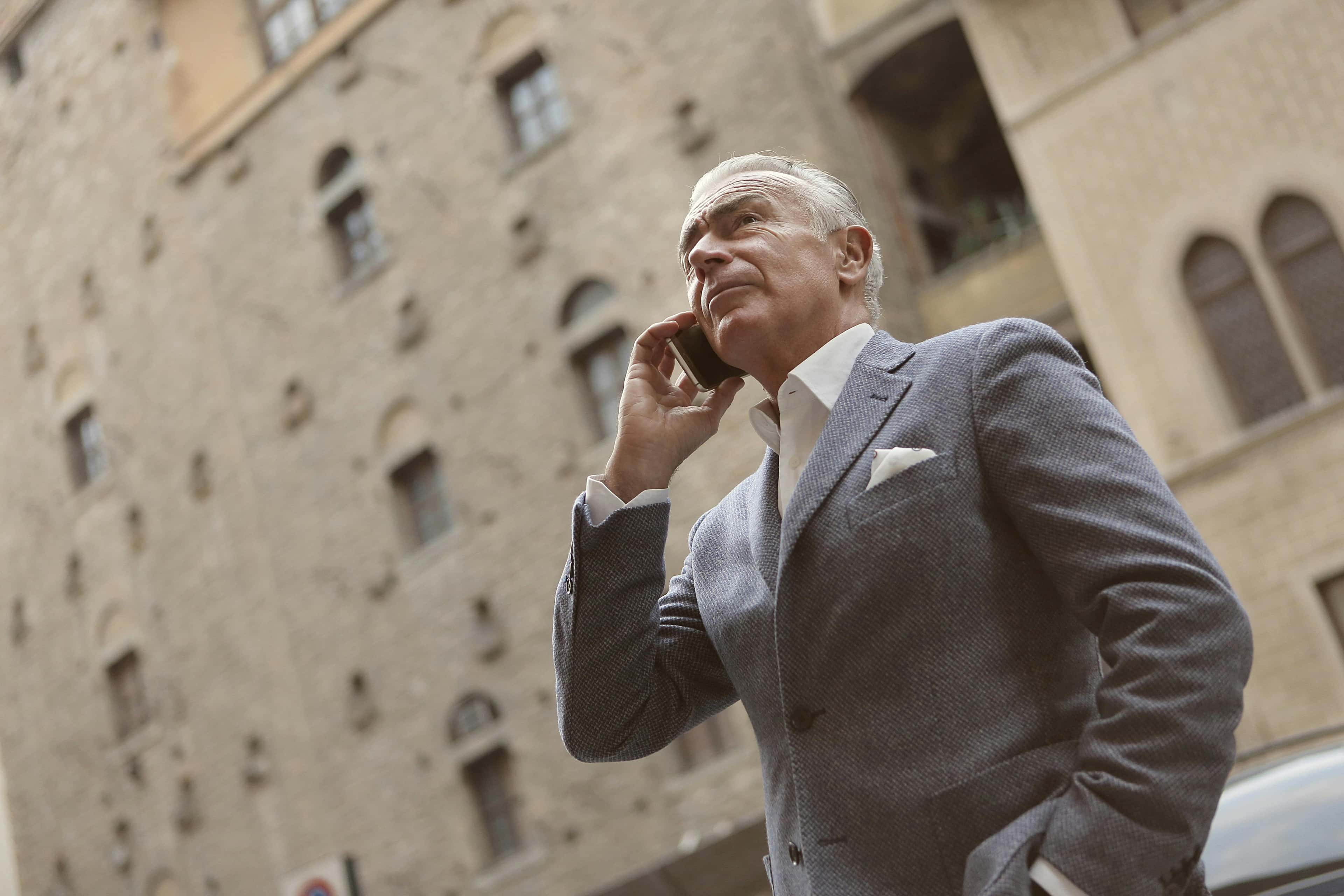 Business professional taking an urgent phone call